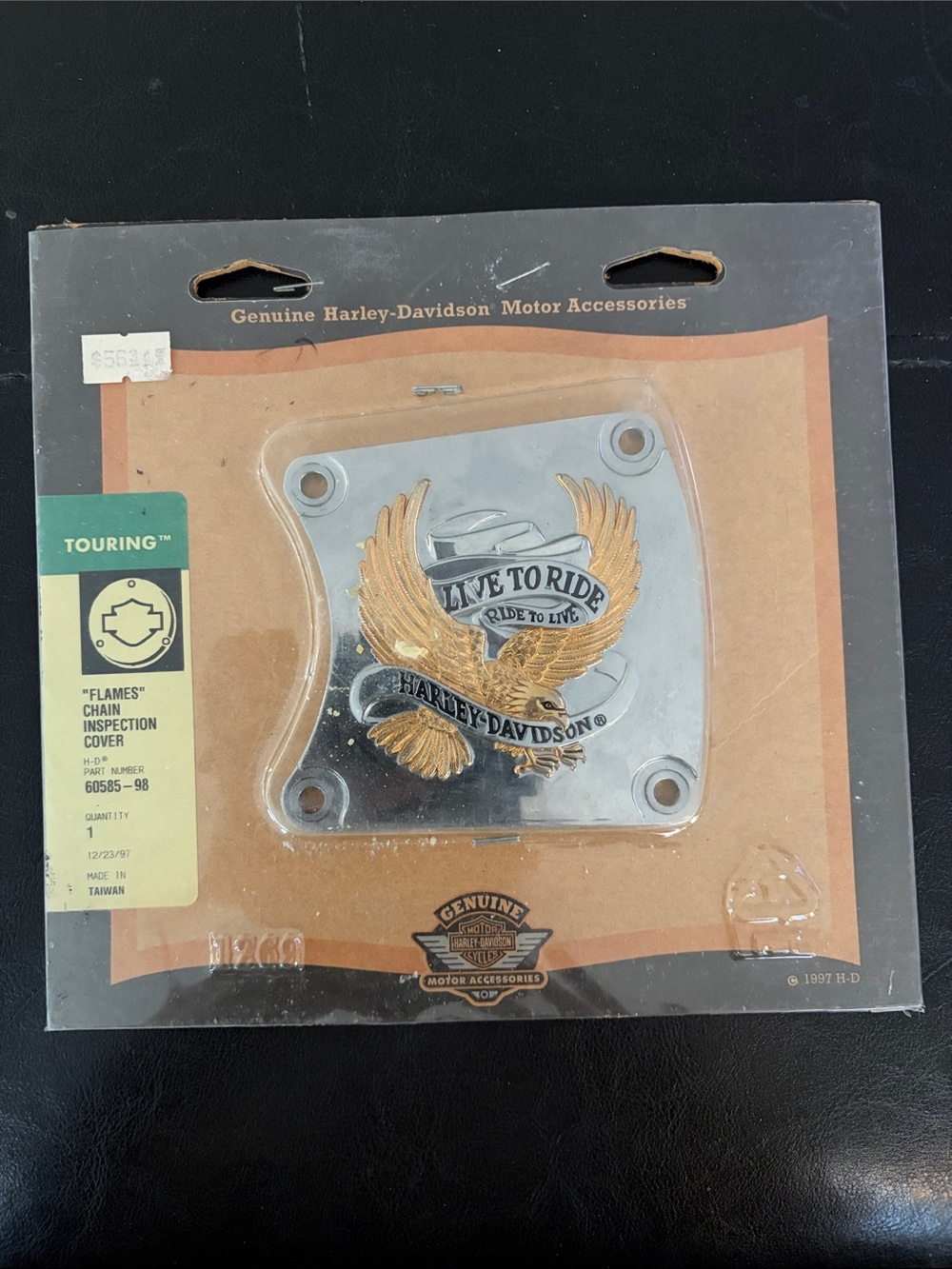 Harley-Davidson "Flames" chain inspection cover (part number 60585-98)